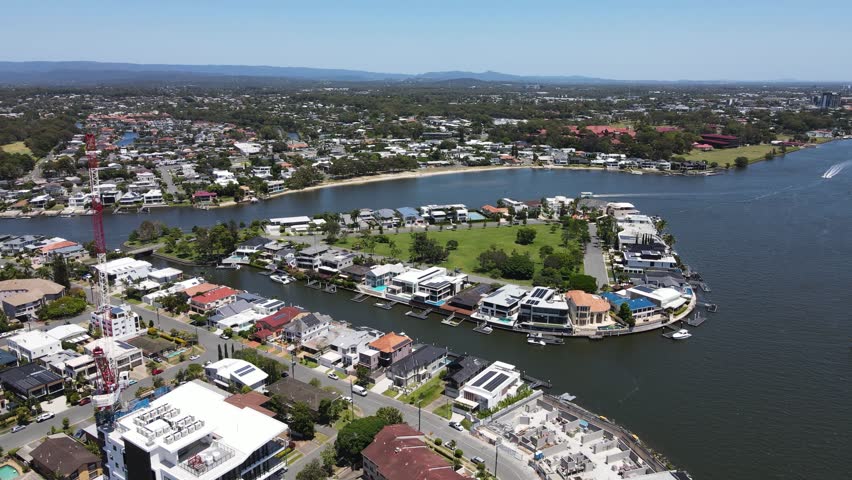 Gold Coast suburb Chevron Island and Bundall along the iconic Gold Coast Canal network and residential housing real estate. Creative drone view