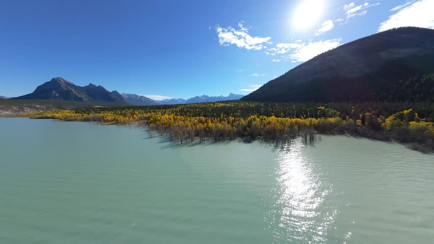 FPV Drone View Over Abraham Lake In The Autumn Season