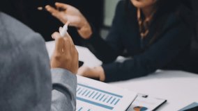  businessman in meeting analysis chart graphy marketing plan in business financial audit project. Or Business adviser analyzing Budget. - Powered by Shutterstock - Get 15% off with code: PIKWIZARD15