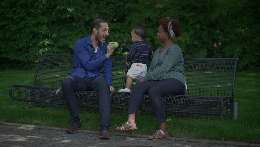 Family Bonding in the Park A Heartwarming Moment Filled with Love and Togetherness