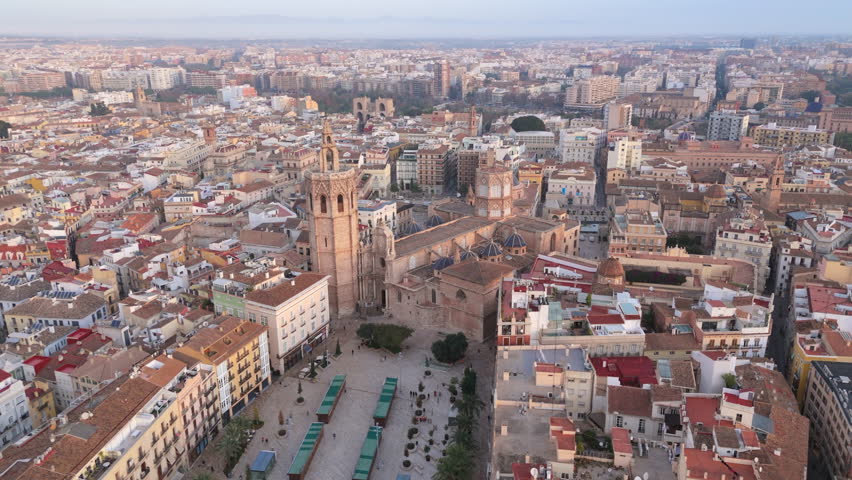 Explore the stunning beauty of Valencias Plaza de la Virgen, surrounded by historic architecture in Spains Old Town. This vibrant city offers rich culture and exceptional attractions, a mustvisit