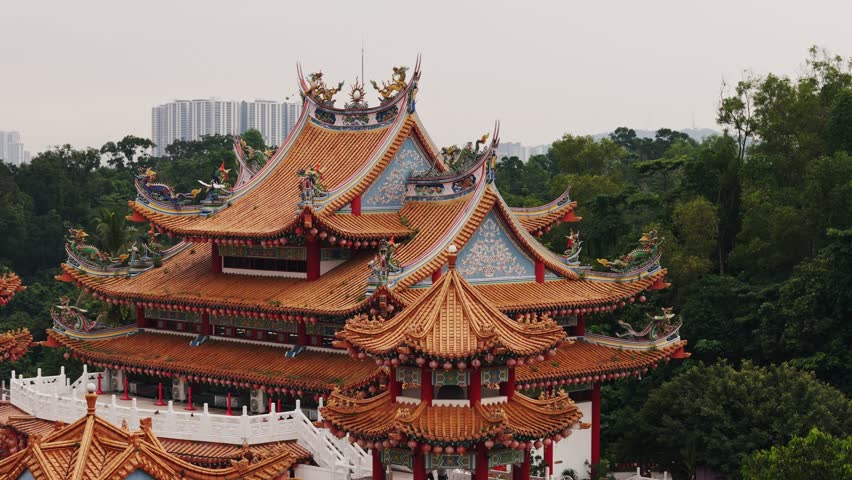 Aerial View of Buddhist Thean Hou temple, a chinese temple in kuala lumpur, stands majestically amidst residential buildings and lush greenery