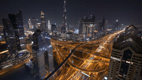 Nighttime view of a futuristic city with vibrant skyscrapers and illuminated highways - Powered by Shutterstock - Get 15% off with code: PIKWIZARD15