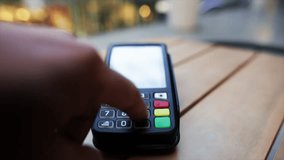 Customer hand carefully entering personal identification number on point of sale terminal, demonstrating secure electronic payment method during retail transaction with banking technology - Powered by Shutterstock - Get 15% off with code: PIKWIZARD15