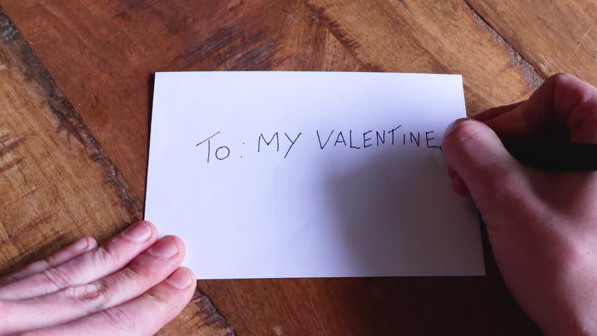 Happy Valentine's Day: Writing 'My Valentine' on a white envelope. 50fps in 50fps timeline.