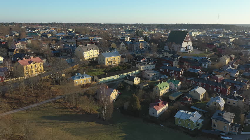 Porvoo.Finland-December 12.2020: Awesome aerial shot of the historical architecture in Porvoo Finland. Evangelical Lutheran Church. Aerial shot with the drone slowly moving sideways.