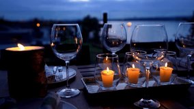 Happy Valentine's day: Romantic candlelit dinner. Table is set for Valentines day celebration with red and pink color lights and heart shaped candles. valentine's day romantic setting valentine's dinn - Powered by Shutterstock - Get 15% off with code: PIKWIZARD15