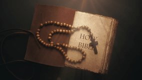 Holy Bible and wooden cross on the desk. Spirituality religion and hope concept. Symbol of supplication believe and faith for Christian People. Abstract vintage historical religious dark background - Powered by Shutterstock - Get 15% off with code: PIKWIZARD15