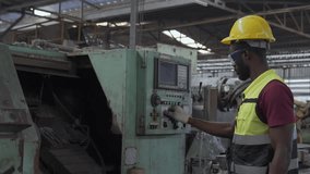 Staff or technicians are checking the operation of the old machine. Young technician engineer operate machine to automated CNC in factory. - Powered by Shutterstock - Get 15% off with code: PIKWIZARD15