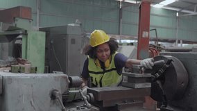 Young technician engineer operate machine to automated CNC in factory. African american mechanical engineer operating industrial lathe machine. - Powered by Shutterstock - Get 15% off with code: PIKWIZARD15