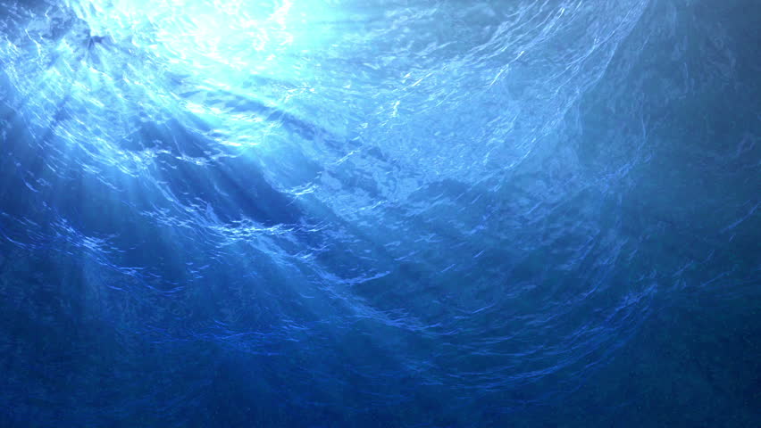 High quality Looping animation of ocean waves from underwater with floating plankton. Light rays shining through. Great popular marine Background. (seamless loop, HD, high definition 1080p)
