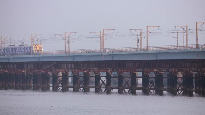 train passed on bridge the bhaynder khadi