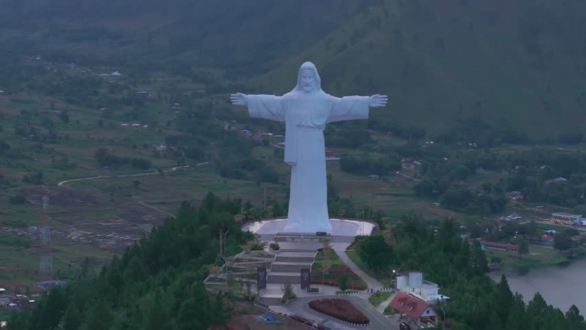 Aerial view of Jesus Christ on Sibeabea Hill in North Sumatra, overlooking Lake Toba