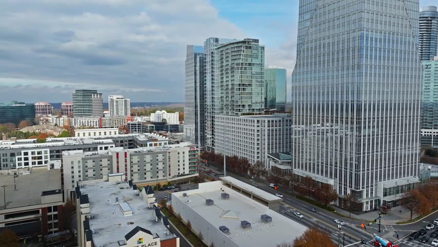 Aerial view of modern towers of downtown in Suburb District of Atlanta City, Georgia. CLoudy day in fall season. Wide shot.