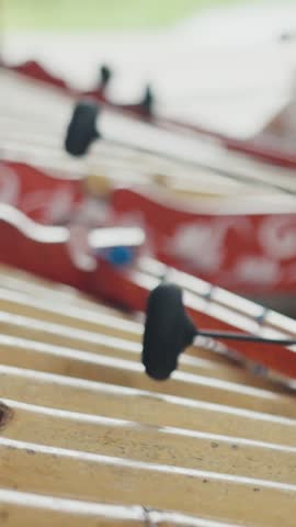 Musicians playing traditional thai alto xylophone ranat ek