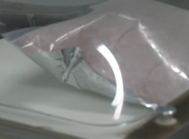 Vacuum packaging of sliced ??meat