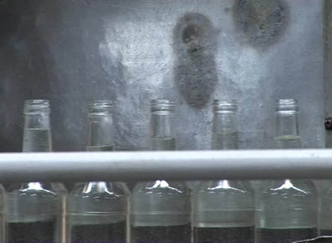 Conveyor bottling vodka