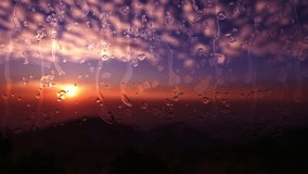 Animated rain drops flow down the glass in the evening sunset Video - Powered by Shutterstock - Get 15% off with code: PIKWIZARD15