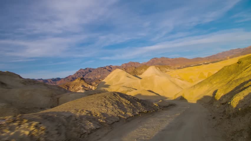Embark on an exciting drive through Twenty Mule Team Canyon in Death Valley National Park, California, where scenic views await around every corner.