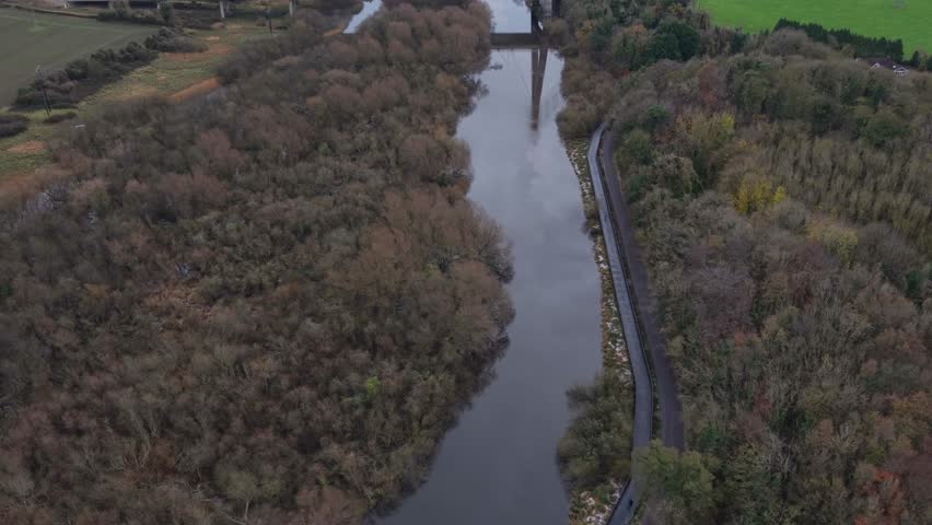 Mary mcaleese boyne valley bridge crossing lush fields and boyne river , aerial view