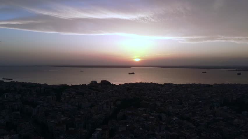 Thessaloniki Greece City Center Aerial Crane Shot, Thermaikos, Golden Hour Backlit View at Dawn