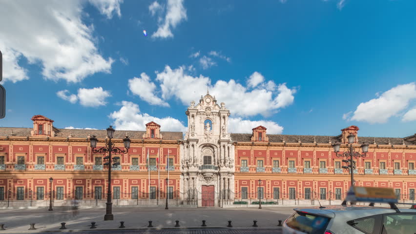 The Palace of San Telmo timelapse hyperlapse in Seville, Spain. Formerly university for navigators, now the seat of the Andalusian Government. Baroque architecture with ornate facade and rich history