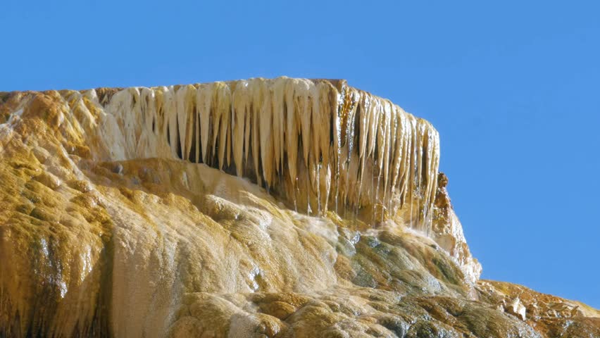 Mammoth Hot Springs is a large complex of hot springs on a hill of travertine in Yellowstone National Park adjacent to Fort Yellowstone and the Mammoth Hot Springs Historic District.