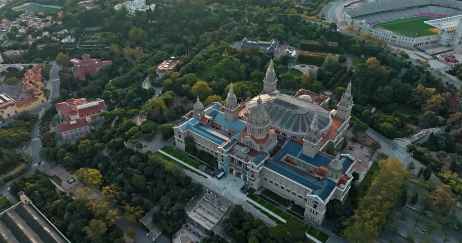 Aerial view aerial National Museum of Art of Catalonia, Barcelona. Historical building architecture of tourist points in the cityscape of the Catalan city in Spain. High quality 4k footage