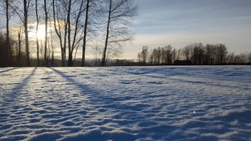 Calm winter landscape, snowy field scenery at sunset - Powered by Shutterstock - Get 15% off with code: PIKWIZARD15