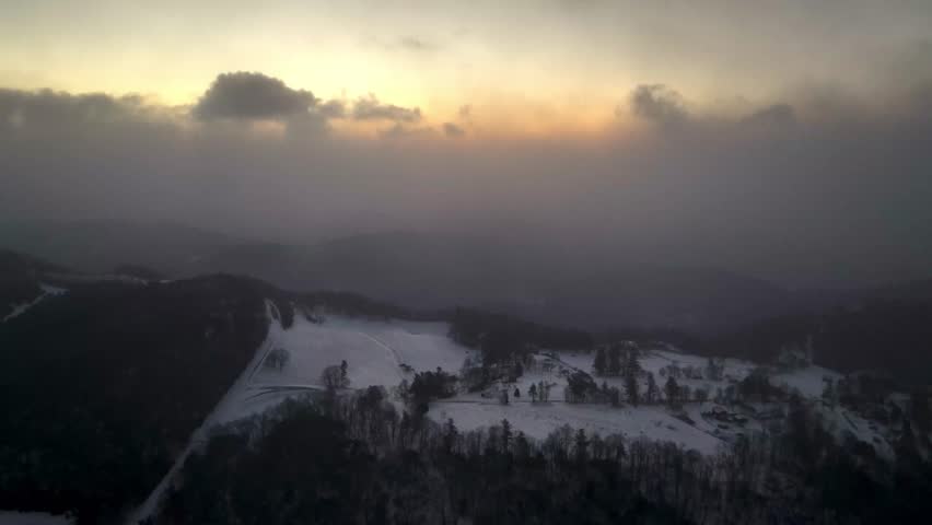 clouds at sunrise aerial in appalachia near boone nc, north carolina