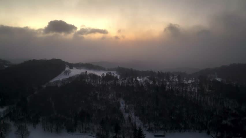 aerial tilt up in appalachia at sunrise near boone nc