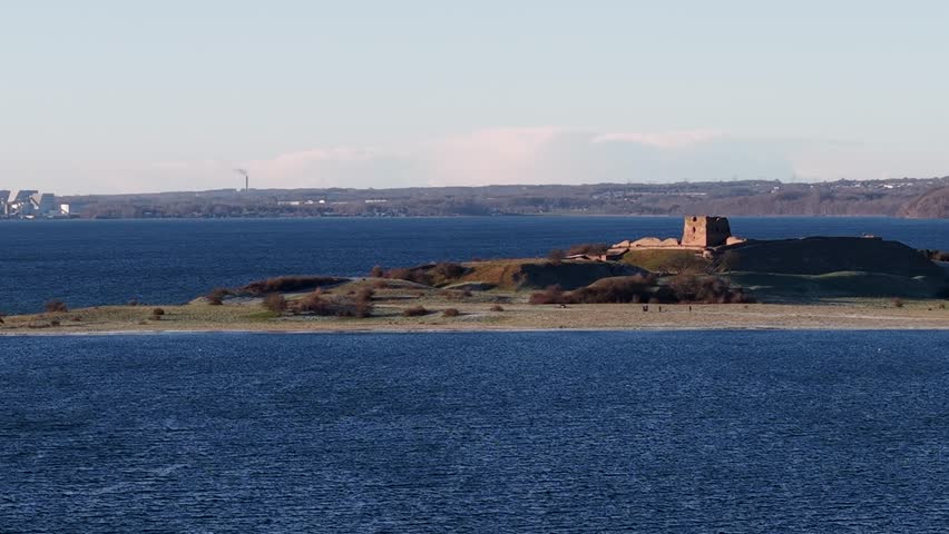Aerial view of Kalø Castle lit up by sunlight, Viking Fortress, Denmark
