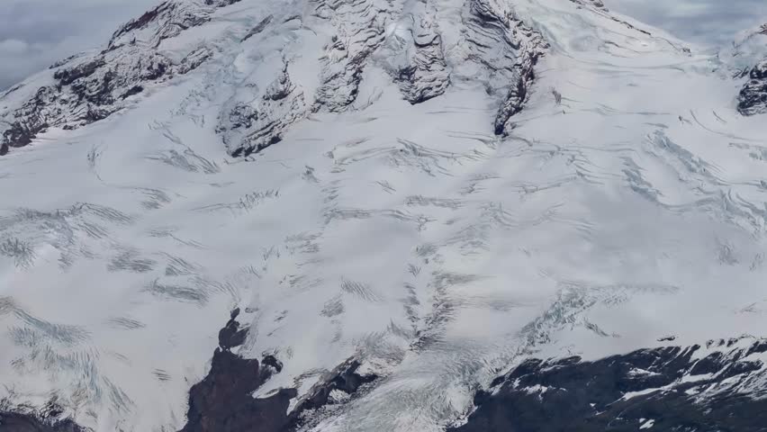 Close-up aerial view of Mountain glacial ice and snow. Majestic and powerful, a symbol of nature
