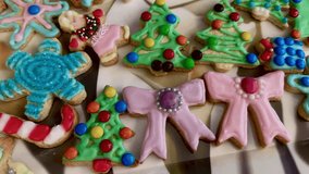 Christmas sugar cookies baking iced biscuits - bows trees snowflake - Powered by Shutterstock - Get 15% off with code: PIKWIZARD15