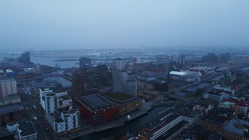 Beautiful aerial of high rise buildings in the modern part of Malmö, Sweden on a fog covered morning