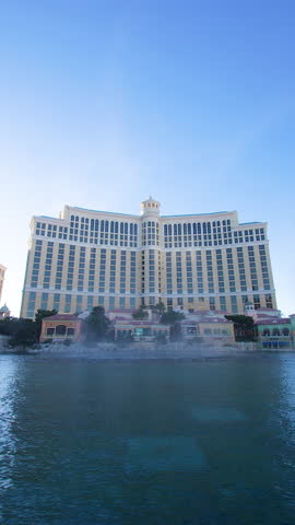 Fantastic water Show in Las Vegas. Fountains of Bellagio Daytime View. Vertical 4K Timelapse. Las Vegas, Nevada, USA