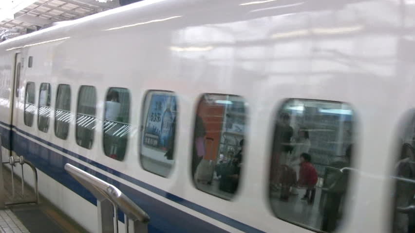High-speed train departs from the station platform