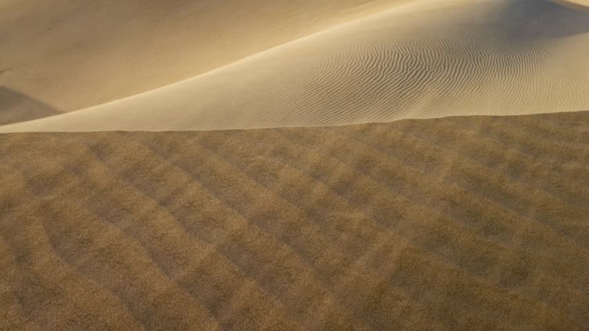 Sandstorm in the deset. Rub' al Khali, aka Empty Quarter desert, Arabian Peninsula. Exploring the beauty of golden sand dunes and shifting patterns at sunset