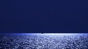 Sailing boat silhouette with starry Milky Way skies and full Moon above open ocean waters.	
 - Powered by Shutterstock - Get 15% off with code: PIKWIZARD15