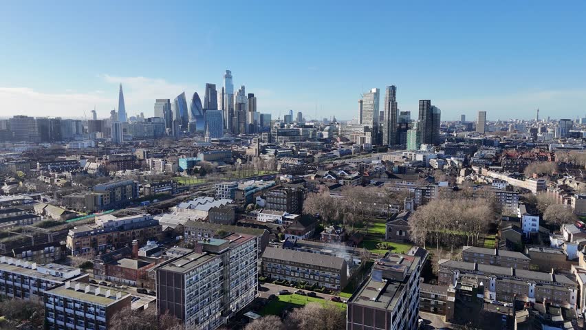 Council housing with London City skyline in background , Tower Hamlets aerial