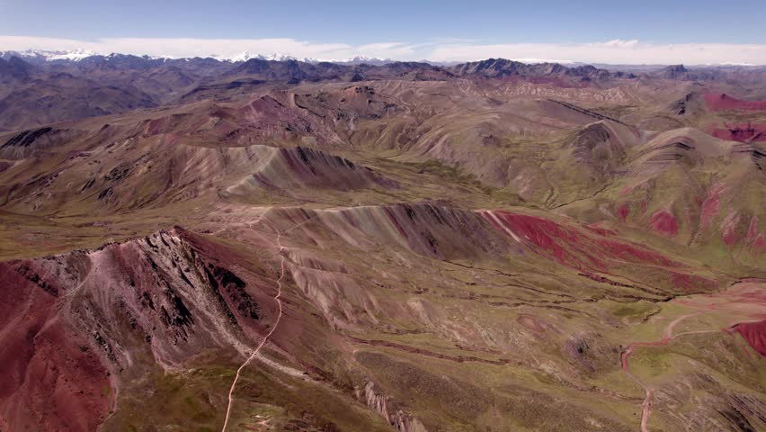An aerial view capturing the colors and contours of the Peruvian Andes.