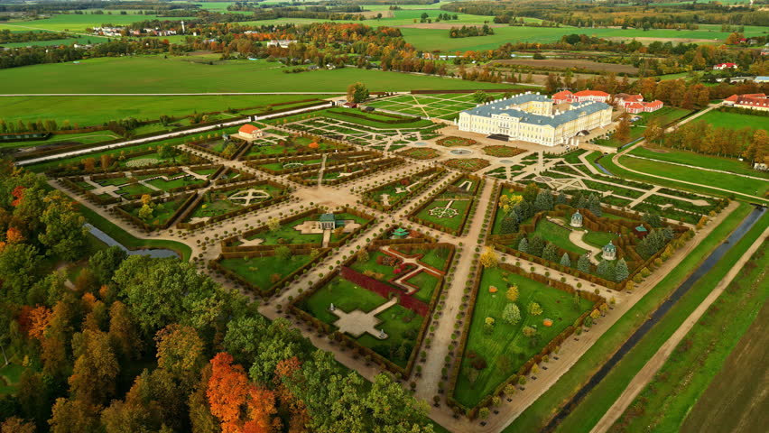 Colorful French Gardens at the Rundale Palace (Rundāles pils). Aerial overview of the contrasting green fields and autumnal foliage