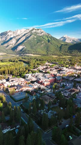Breathtaking aerial view of Banff town nestled in a scenic mountain valley