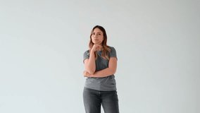 Woman Contemplating And Having Brilliant Idea Or Solution On White Background - Powered by Shutterstock - Get 15% off with code: PIKWIZARD15