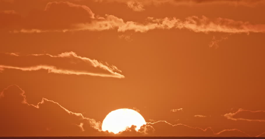 Sunrise over horizon time lapse, 4K cinematic close up of sun rising, nature landscape background, natural video