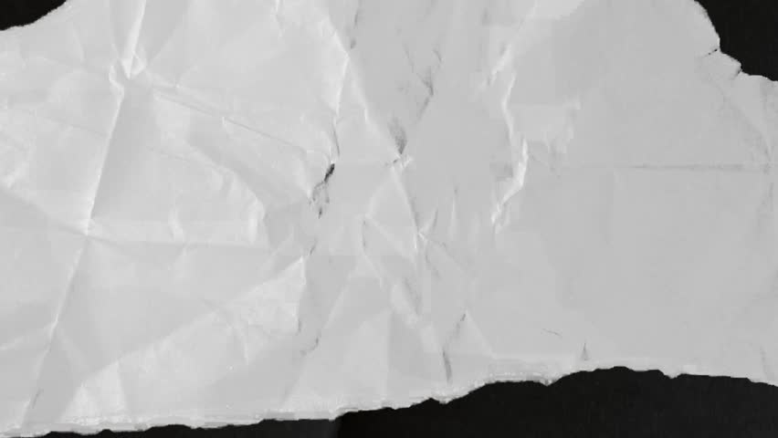 The torn paper and Folds transition animation pack is on a black background. Torn paper transition animation with key color. 4k video