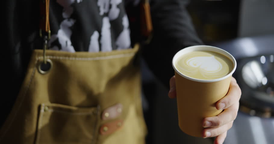 Enjoy Tasty Coffee, Closeup View Of Barista Hands Holding Cardboard Cup With Cappuccino