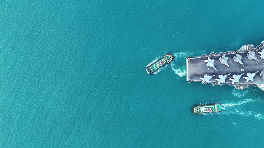 Nuclear war ship, Navy ship, Military navy. nuclear carrier running in the ocean. Military navy ship carrier full loading fighter jet aircraft for prepare troops