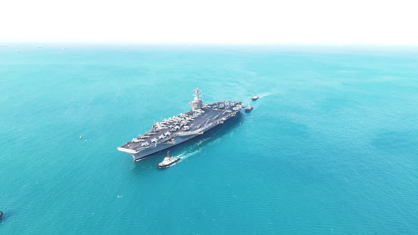 Nuclear war ship, Navy ship, Military navy. nuclear carrier running in the ocean. Military navy ship carrier full loading fighter jet aircraft for prepare troops