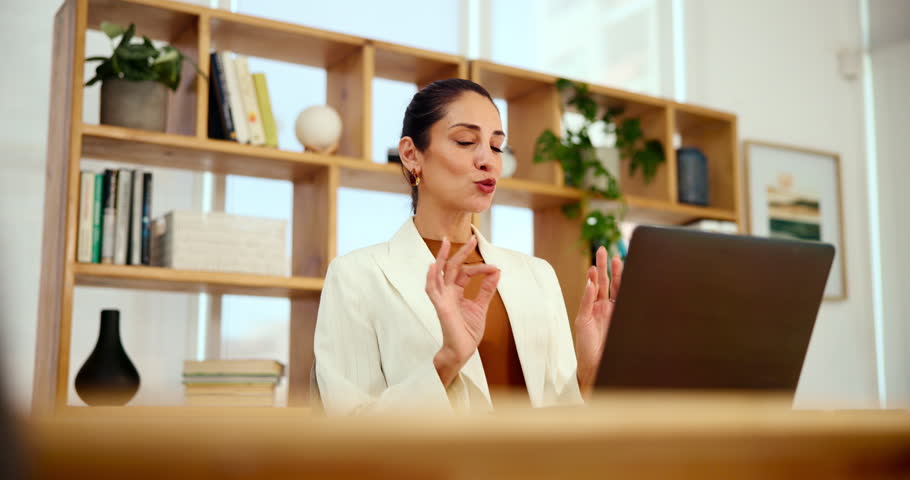 Woman, laptop and video call in office for therapy, healing advice and virtual session with client. Psychologist, technology and online consultation in practice with discussion, meeting or telehealth